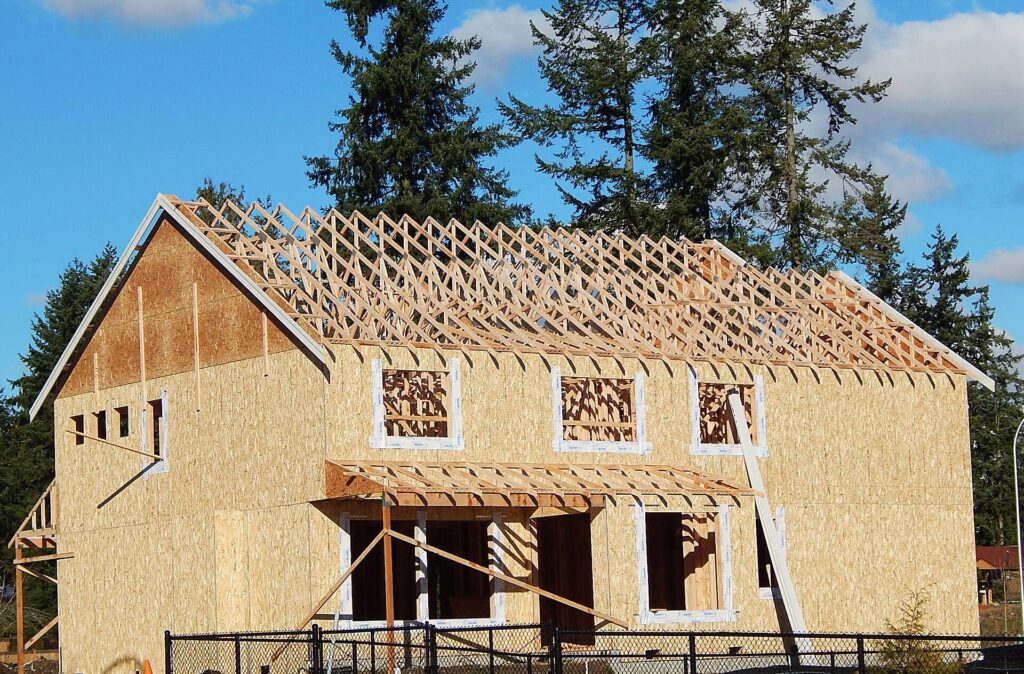 Home under construction showing framing and exterior sheathing